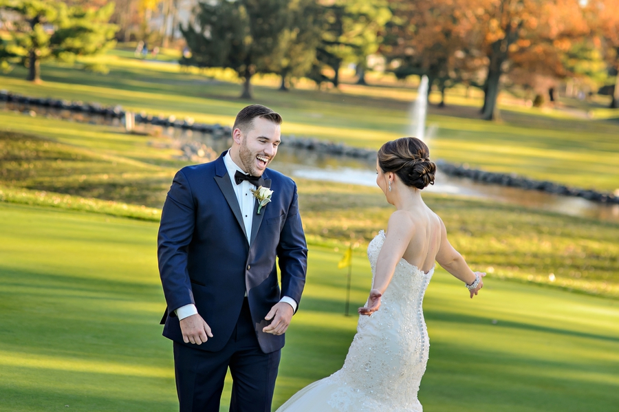 A groom sees his bride for the first time before the ceremony.